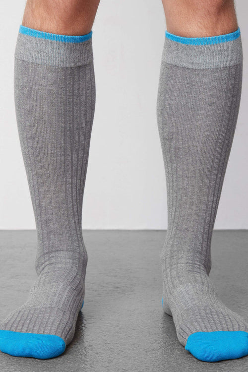 Front view of a man wearing Everyday Extended Crew Sock in Grey Heather