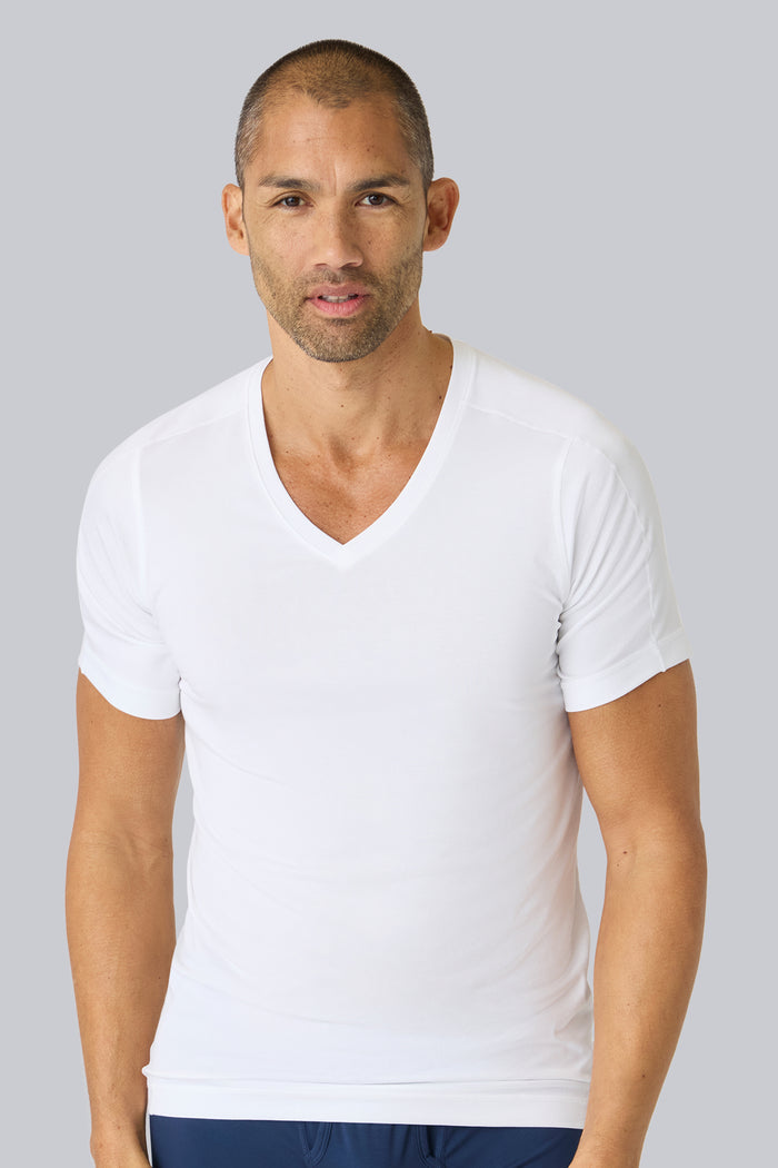 Front view of a man wearing 18HR V-neck Undershirt in Bright White