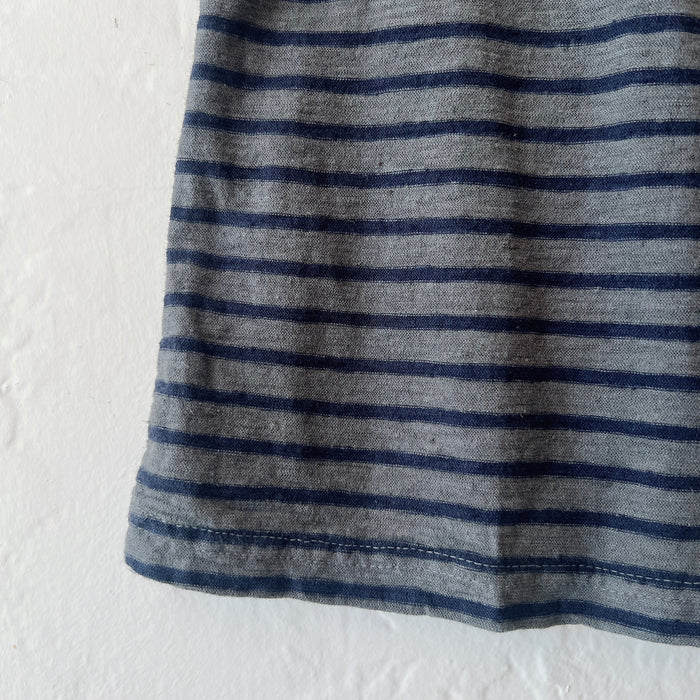 Close-up of a gray and black striped fabric on a white background