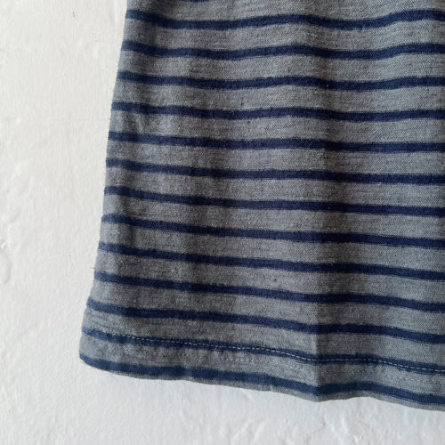 Close-up of a gray and black striped fabric on a white background