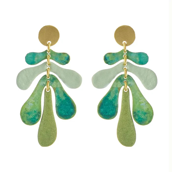Pair of Sibilia Agua Viva Earrings in Green, featuring a matte gold disc stud top with three tiers of organic teardrop-shaped treated brass drops in graduating teal, sage green, and olive green patina, connected by gold jump rings, on a white background