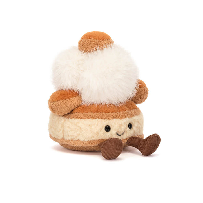 Plush toy resembling a marshmallow pastry with brown and white colors on a white background