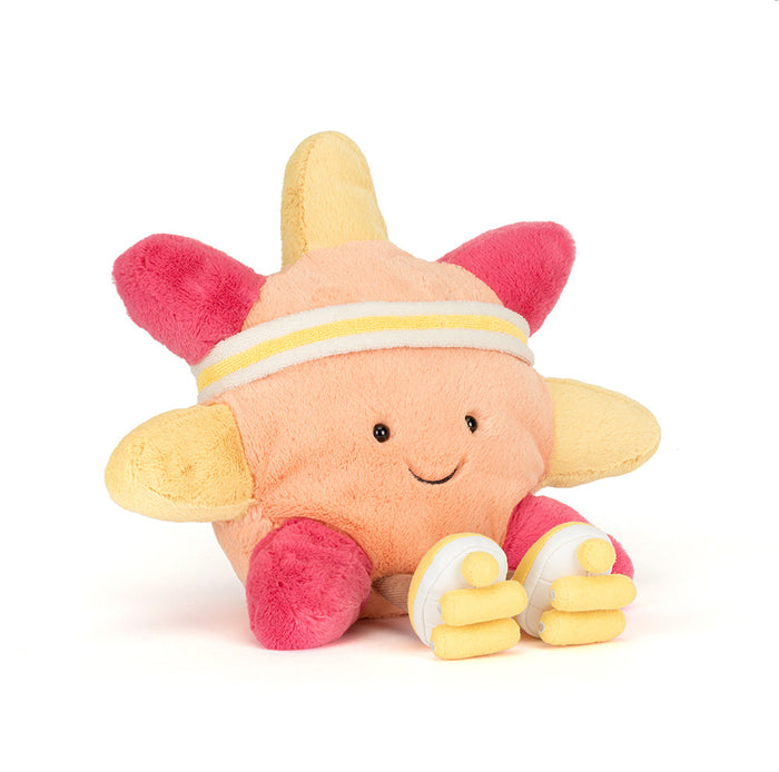 Plush toy with a star-shaped body and pink accents on a white background