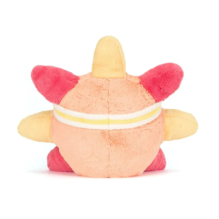 Plush toy resembling a sun with pink accents on a white background, viewed from the back