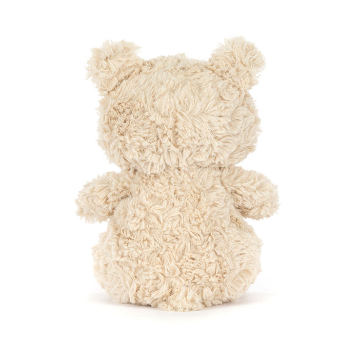 Rear view of Jellycat Bartholomew Bear Junior showing curly cream fur and rounded ears on a white background