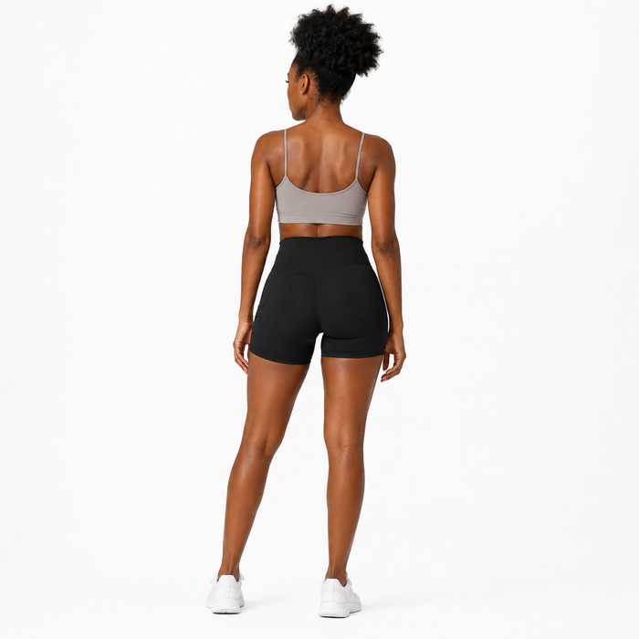 Classic Black women's bike shorts, full back studio view showing fitted silhouette and seam construction