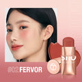 Blush stick shown in a cream makeup format for adding cheek color, with a compact applicator for storage in a makeup bag.