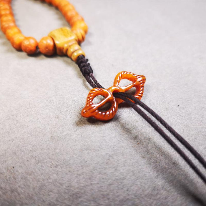 Bone Vajra Amulet 1.18" - Tibetan Buddhist amulet, detailed view