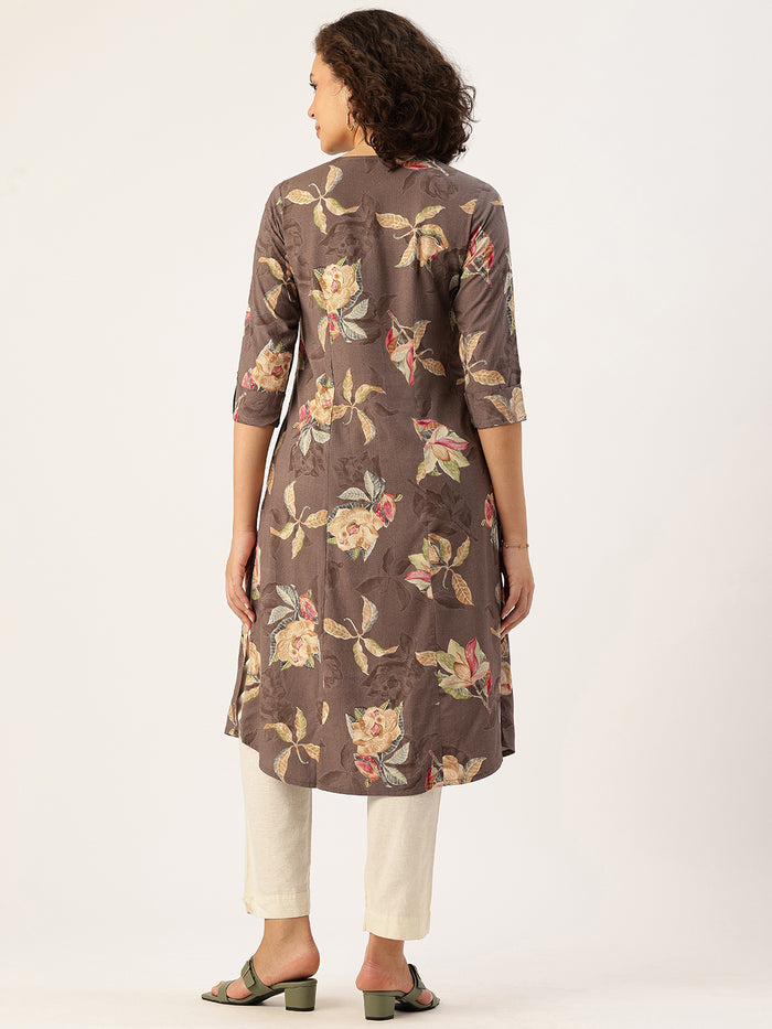 Woman wearing a floral-patterned brown kurta with white pants on a light background, Brown Floral Printed Kurta, Princess Cur Kurta, A-Line Kurta, Floral Print, Mandarin Collar kurta, printed kurta