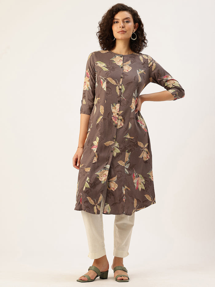 Woman wearing a floral-patterned brown kurta with white pants on a light background, Brown Floral Printed Kurta, Princess Cur Kurta, A-Line Kurta, Floral Print, Mandarin Collar kurta, printed kurta