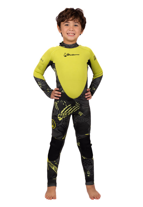 Smiling child wearing the Waihana Children's Lime Fishbone Steamer wetsuit in bright lime green and dark grey fishbone-patterned neoprene, standing confidently with hands on hips against a white studio background.