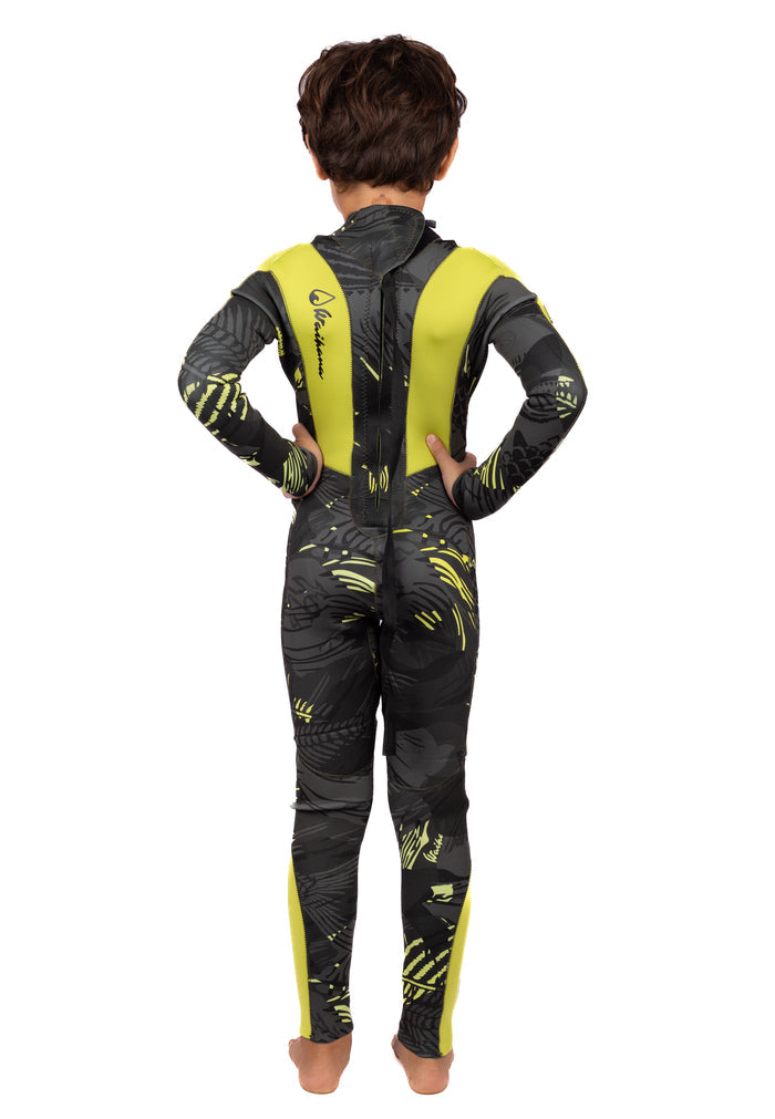 Back view of a child wearing the Waihana Children's Lime Fishbone Steamer full-length wetsuit in dark grey and lime yellow-green fishbone pattern with back zip, on a white studio background.