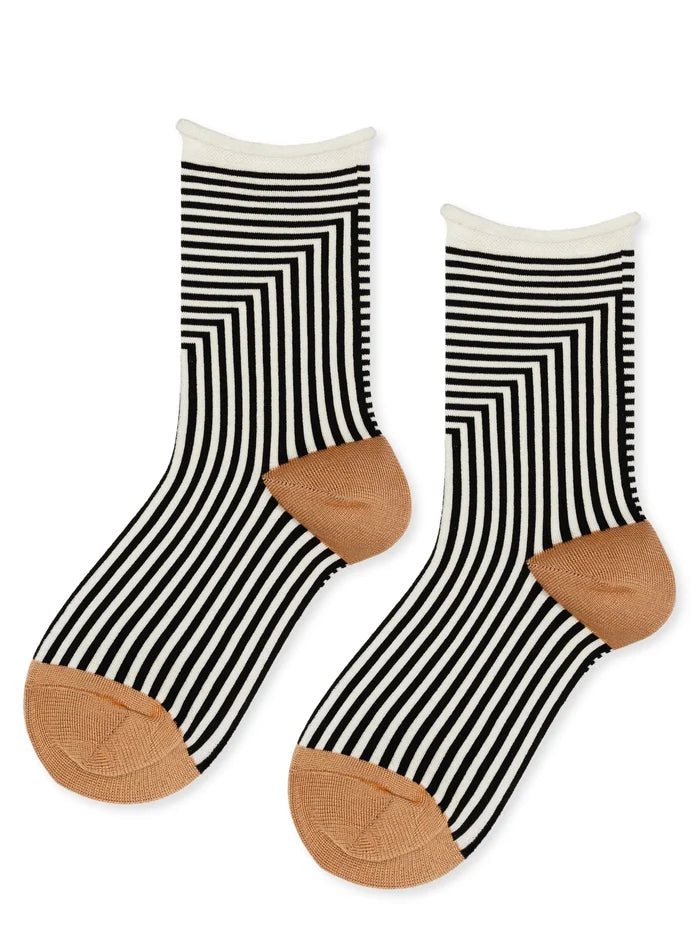 Corbusier Crew socks in Black — graphic black and white op-art stripe with cream rolled cuff and tan heel and toe, flat lay product shot on white background
