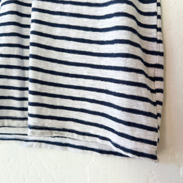 Navy and white striped fabric on a white background