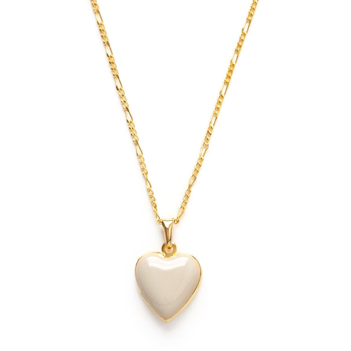 A beige heart-shaped locket on a gold-colored chain.