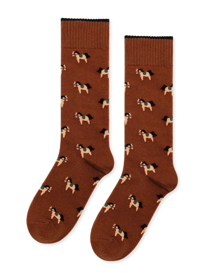 Equestrian Crew socks in Brown — rich brown cotton boot-height crew with allover equestrian horse motif and black ruffle cuff, flat lay pair on white background
