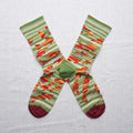 Colorful striped socks on a light gray background