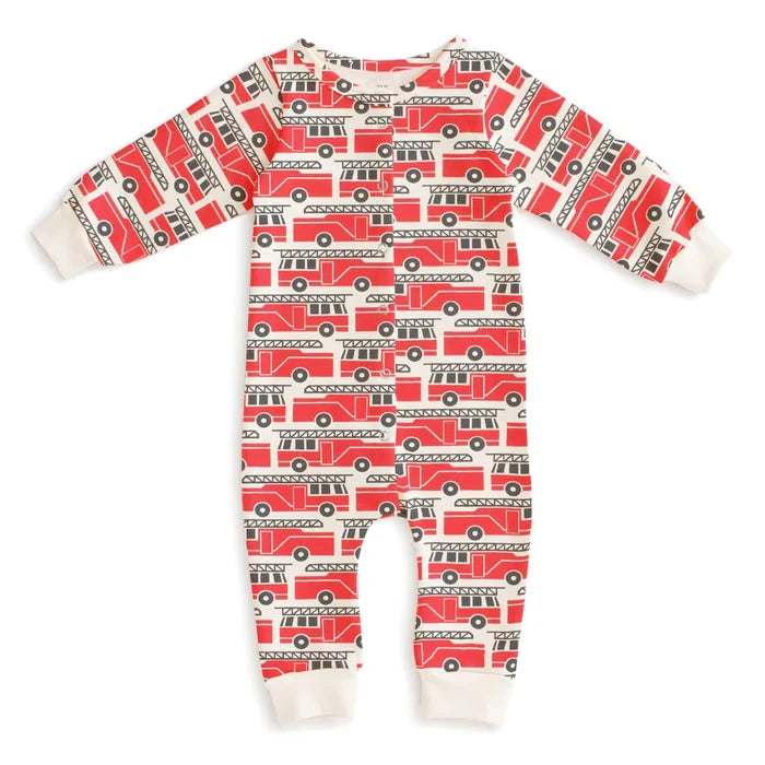A baby long-sleeve footless french terry one-piece jumpsuit with an all-over red fire truck pattern on a white background, featuring white ribbed cuffs and ankles.