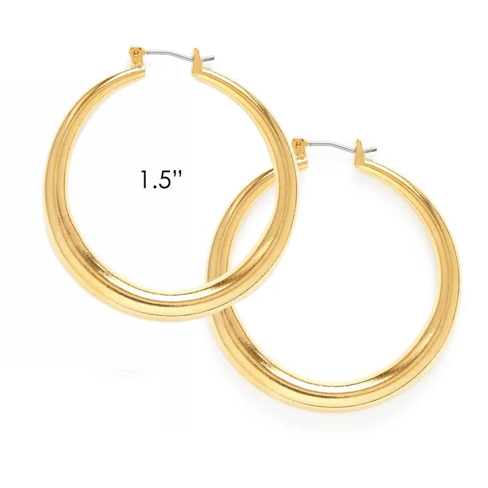 Gold hoop earrings with text reading "one and a half inch" to describe the diameter of the hoop