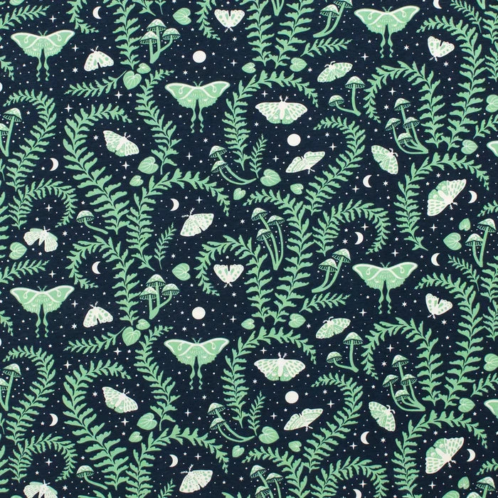 Pattern of green leaves and white butterflies on a dark blue background