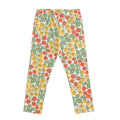 Leggings with a colorful tomato in red, green and yellow pattern on a white background