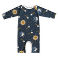 Baby romper with celestial pattern on a white background
