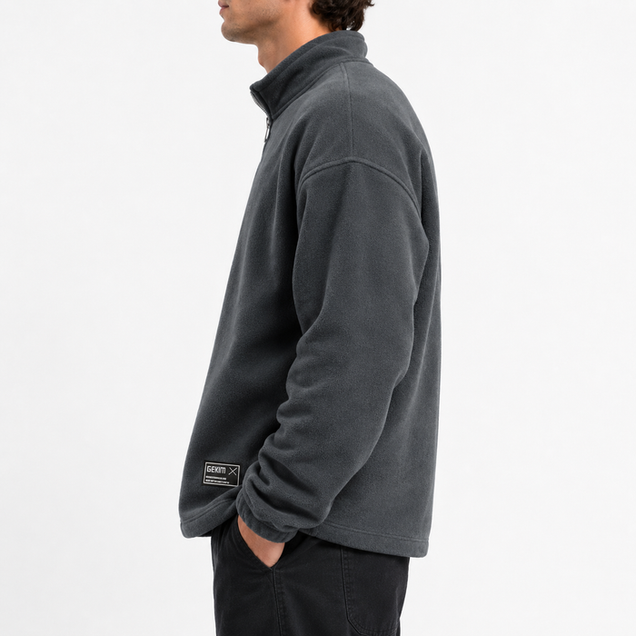 Men's fleece half zip sweatshirt dark gray side fit view on male model
