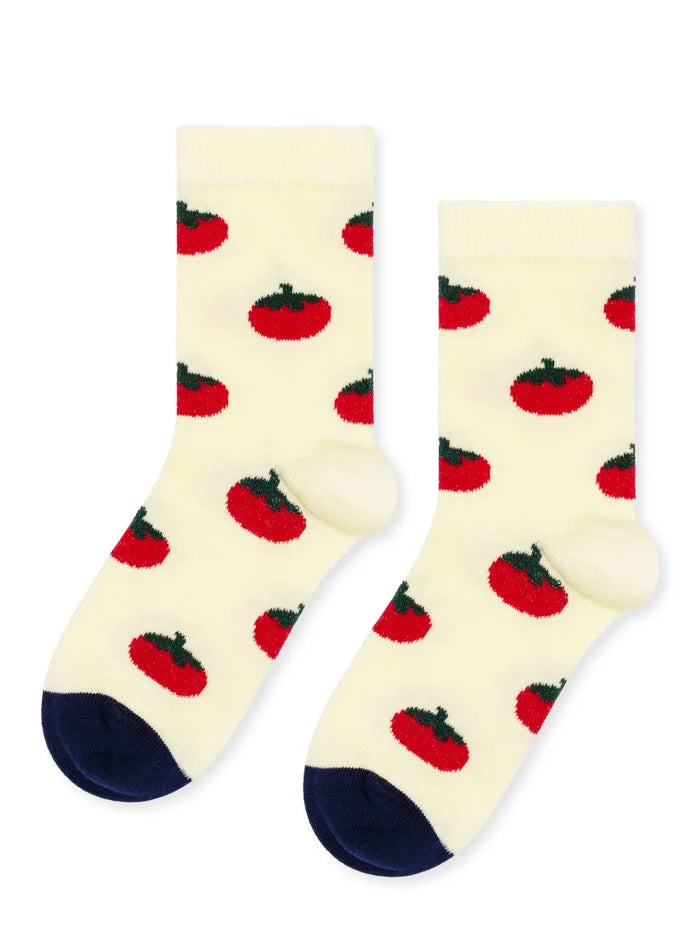 Pair of socks with red tomato pattern on a white background