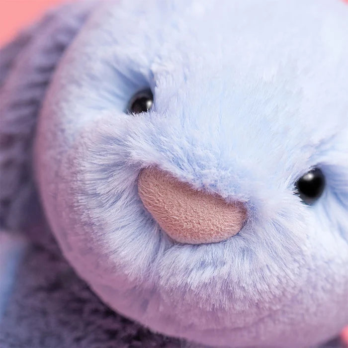Close-up of a plush toy with a soft texture and blue coloring
