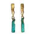 Pair of Sibilia Raiz Earrings in Turquoise Patina, featuring textured gold rectangular stud tops connected via gold rings to elongated turquoise-green patina brass bar drops, on a white background