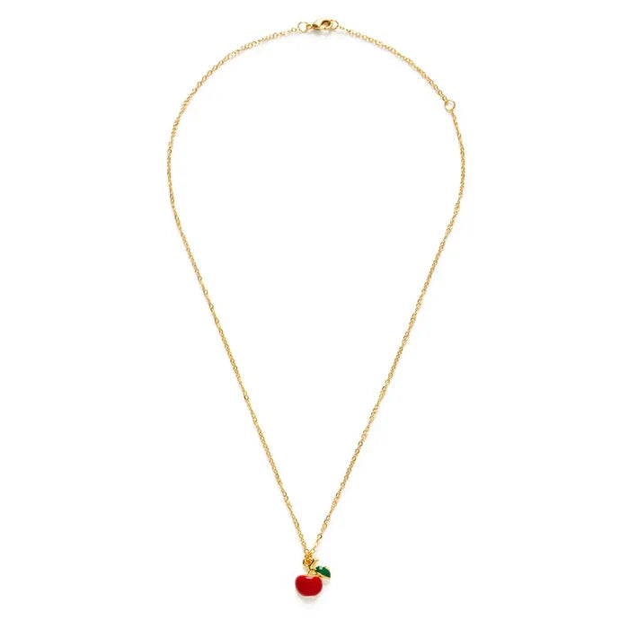 Gold necklace with a red apple pendant on a white background