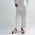 Rib Crop Pant in Chalk, front view, wide-leg cropped silhouette with raw hem, styled with white sandals