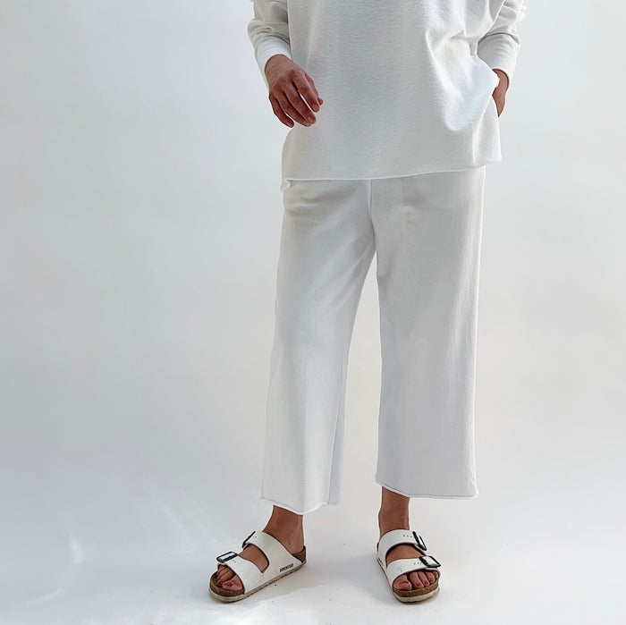 Rib Crop Pant in Chalk, front view, wide-leg cropped silhouette with raw hem, styled with white sandals