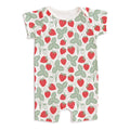 Summer romper in a red and green strawberry print on a whitebackground