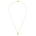 Gold necklace with a small pendant on a white background
